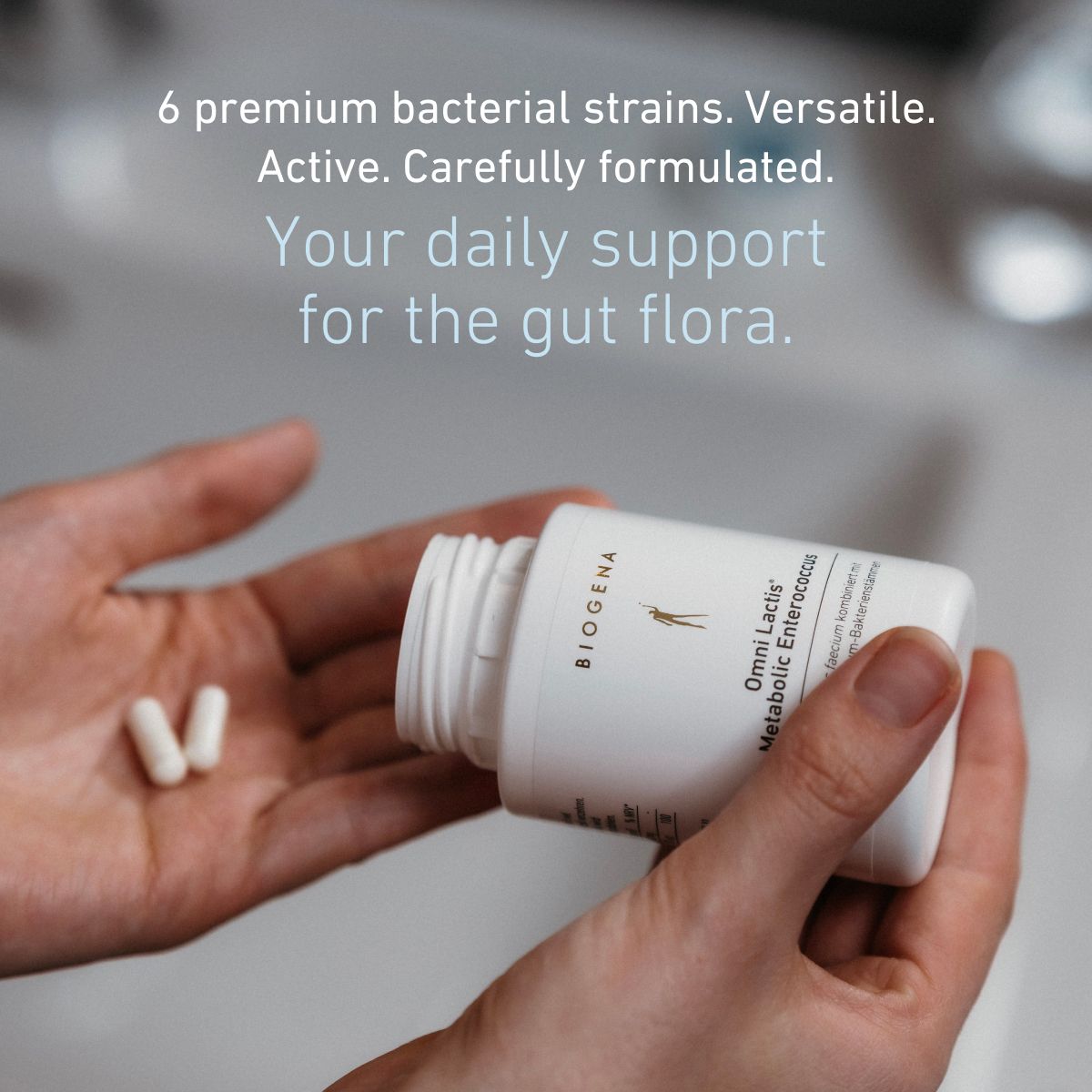 Omni Lactis® Metabolic Enterococcus with six premium bacterial strains. Capsules are dispensed into the hand, representing daily support for the gut microbiome through a carefully formulated probiotic blend.
