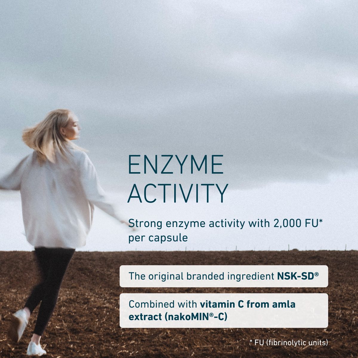 Woman walking on a field path, text about enzyme activity, strong enzymatic effect with 2,000 FU per capsule, contains original NSK-SD® and Vitamin C from Amla extract