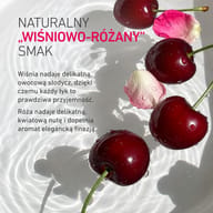 Wiśnie i płatki róży w wodzie z tekstem o smaku. Wiśnia nadaje owocową słodycz, a róża delikatną nutę kwiatową, która elegancko uzupełnia aromat.