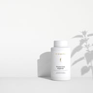 BIOGENA Prosta Care Superior against a minimalist white background, with soft shadows cast by a plant.