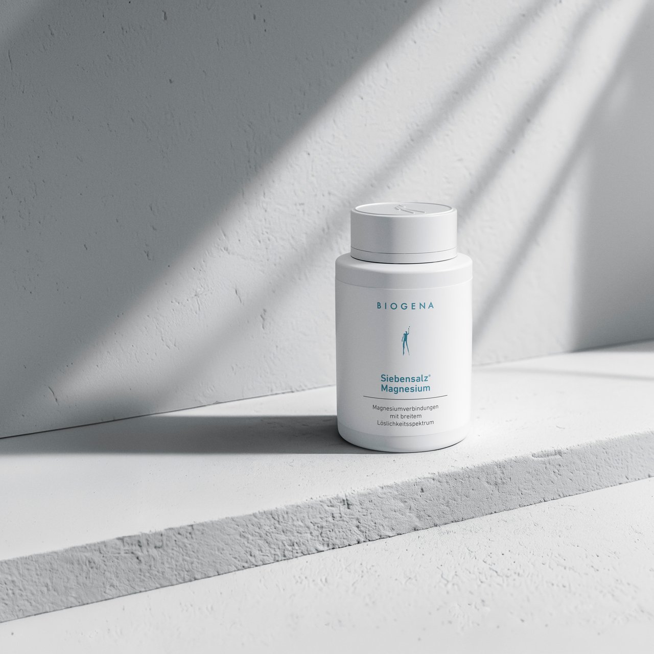 BIOGENA Siebensalz Magnesium, tub, textured wall, plinth, shadows