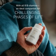 Hand holding Biogena Neurosagena® B-Komplex Active bottle, text highlighting all 8 B vitamins as an ideal companion for challenging life phases.