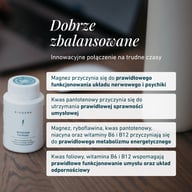 Biała butelka Biogena Antistress Formula® na drewnianym stole, obok otwarta kapsułka, tekst opisujący składniki magnez, kwas pantotenowy, żeń-szeń i witaminy B wspierające nerwy, psychikę i energię.
