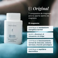 Opakowanie BIOGENA Siebensalz Magnesium na niebieskiej tkaninie, z informacjami o 7 związkach magnezu, metabolizmie energetycznym, zmęczeniu, mięśniach, układzie nerwowym i równowadze elektrolitowej.