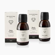 Product image of BIOGENA PETS Relax Drops and Belly Drops for dogs. Shown are one box and one dropper bottle of each product. Relax Drops support mental well-being, while Belly Drops support the gastrointestinal tract.