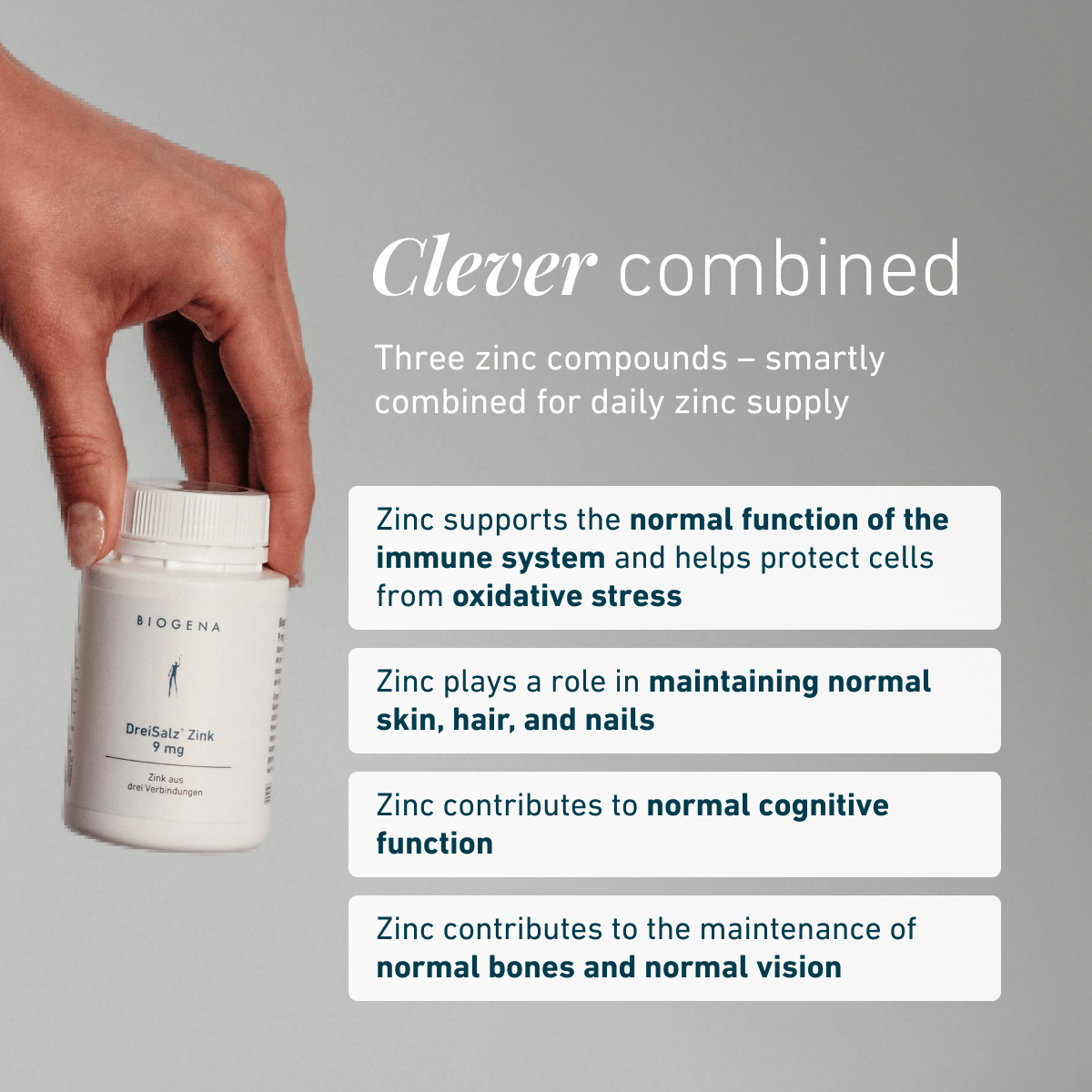 Hand holding Biogena DreiSalz® Zinc 9 mg bottle. Benefits: immune system, skin, hair, nails, cognitive function, bones, vision.